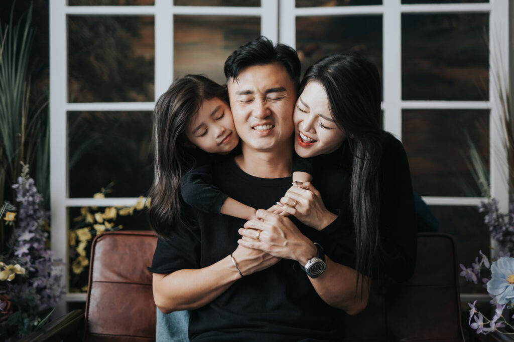 Candid family moments captured by a professional photographer in Penang